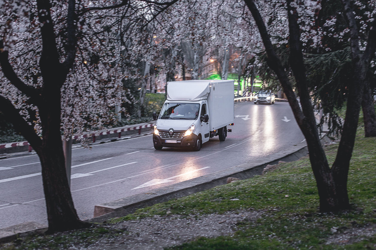 Field Service truck driving on road with gps fleet tracking device installed